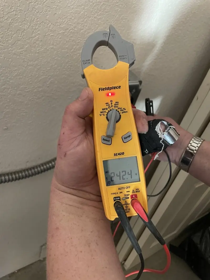 Voltage testing with clamp meter during Electrical Installation Services in South Point